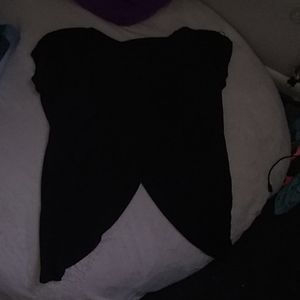 Shirt shows belly button